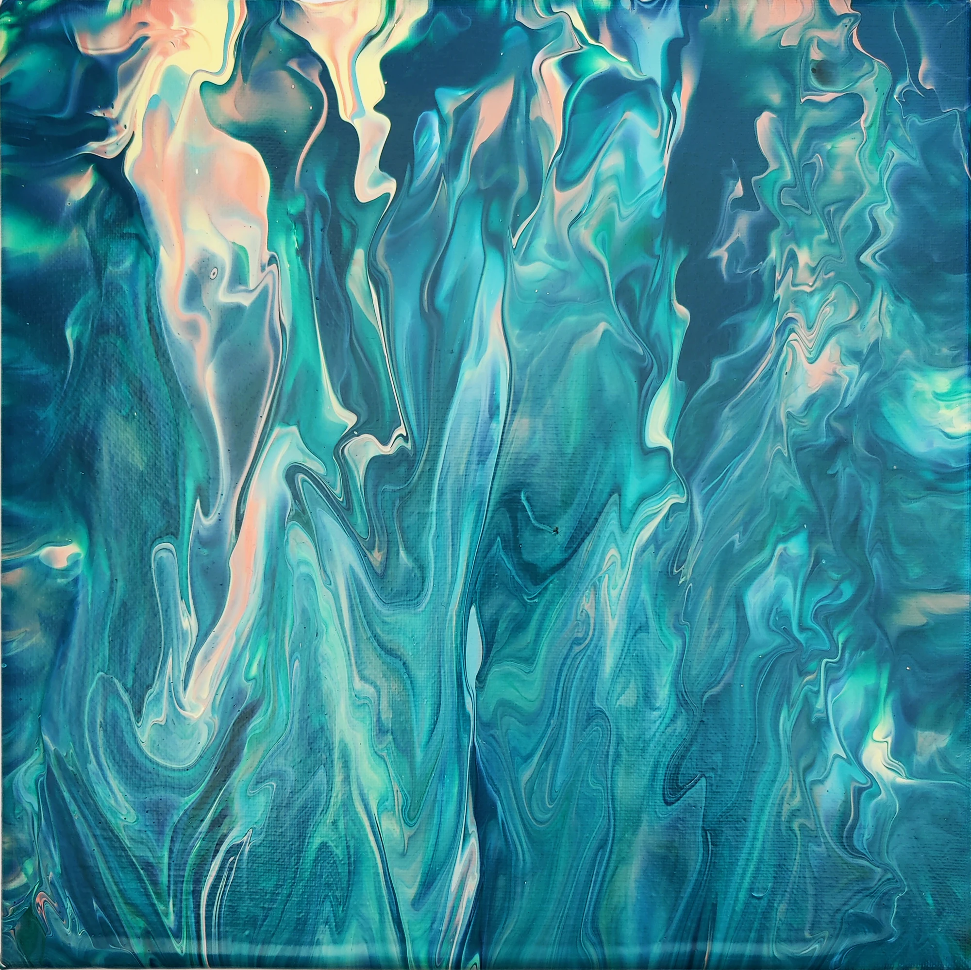 Turquoise currents and pale coral passages stretch vertically across the surface.
